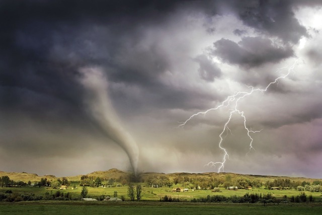 A tornado is shown with a lightning strike.
